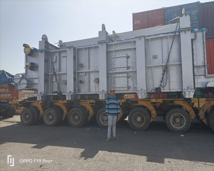 Big Machinery Lashing On Open Container